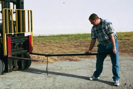 Placing the fork extension on a forklift